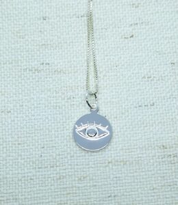 Pingente Plaquinha Redonda Olho gravado 1,2cm Prata 925