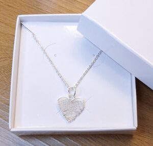 Pingente Coração estilizado 15mm Prata 925